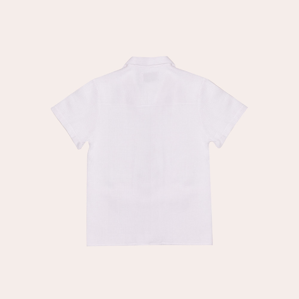 
                      
                        White Waffle Polo
                      
                    