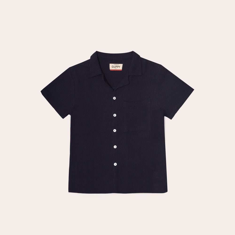 
                      
                        Navy Waffle Polo
                      
                    